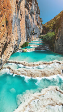 Natural pools of Millpu in Huancaraylla. Turquoise lagoons near Ayacucho, travel destination in Peru