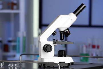 Modern medical microscope on metal table in laboratory