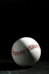 Baseball ball on black background. Sports game