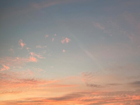 Vermillion sunset sky with blue heaven