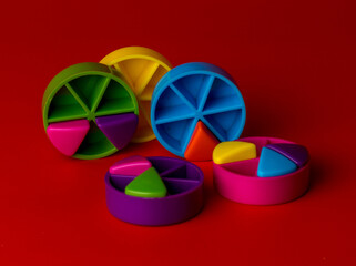 colorful plastic pieces of a well-known board game
