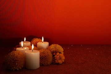 Obraz na płótnie Canvas Flowers of marigold and candles used for altars at day of the day.