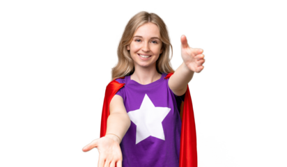 Young English woman over isolated background in superhero costume and doing coming gesture
