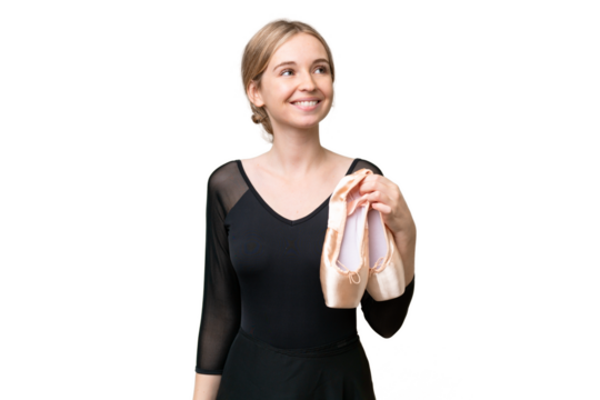 Young English woman practicing ballet over isolated background thinking an idea while looking up