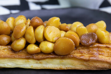 Close up a piece of Macadamia Tart