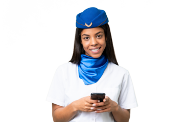 Airplane stewardess African american woman over isolated background sending a message with the mobile