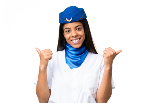 Airplane stewardess African american woman over isolated background with thumbs up gesture and smiling - Powered by Adobe