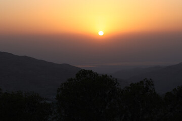 beautiful sky at sunset from valley in front of dead sea
