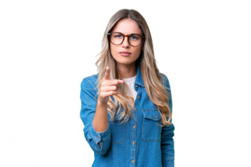 Young Uruguayan woman over isolated background frustrated and pointing to the front
