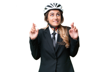 Business Uruguayan woman wearing a helmet biker over isolated background with fingers crossing
