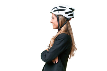 Business Uruguayan woman wearing a helmet biker over isolated background in lateral position