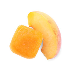 Frozen nectarine puree cube and fruit on white background, top view