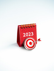 Happy new year 2023 background. 3d target icon with red 2023 year numer desk calendar cover red...