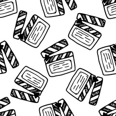 clapper board vector seamless patterns from the movie clapperboard doodle. The hand-drawn the movie is an isolated black outline positioned on white Light, Camera, Action