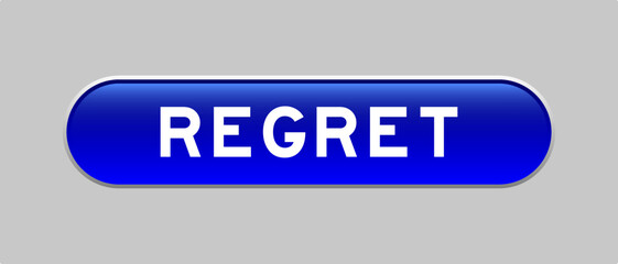Blue color capsule shape button with word regret on gray background