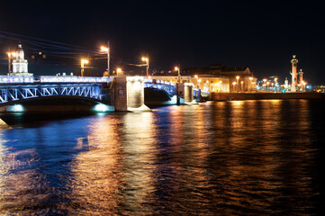 Fototapeta na wymiar Palace Bridge over the Neva River at night in Saint- Petersburg, Russia
