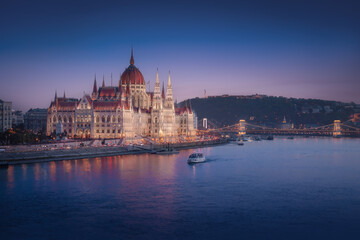 Fototapeta na wymiar Hungarian Parliament, Danube River and Szechenyi Chain Bridge at night - Budapest, Hungary