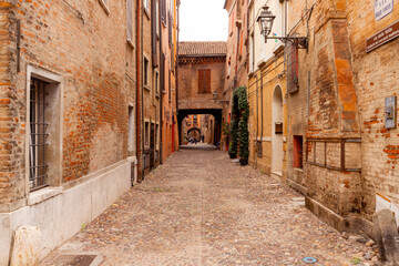 Historic streets of Ferrara, Italy. Narrow streets, historic building facades.