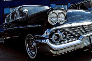 Color detail on the headlight of a vintage car