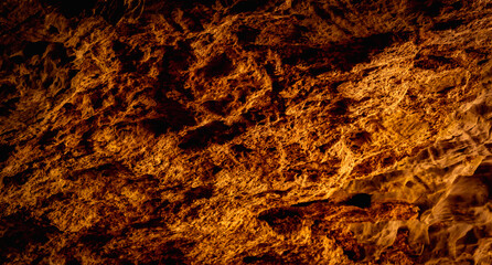 Beautiful texture of dark stone background in the cave