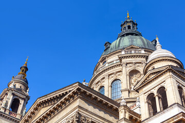 Fototapeta na wymiar St Stephen Basilica in Budapest Hungary . Church dome and belfry against sky