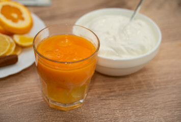 Chicken yolks in a glass for making pie dough.