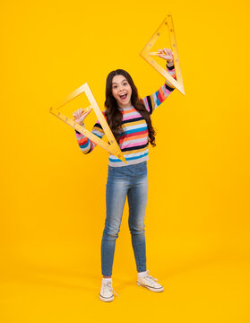 Fototapeta Amazed teenager. Back to school. Teenager school girl on isolated background. Excited teen schoolgirl with school supplies.