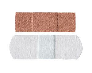 Two different adhesive plasters or bandages isolated.
