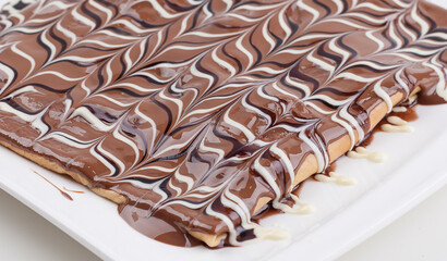 chocolate cake on a white plate