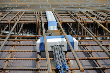 PERAK, MALAYSIA -APRIL 12, 2016: Floor slab reinforcement bar with post tension cable tendon on timber form work at the construction site in Perak, Malaysia