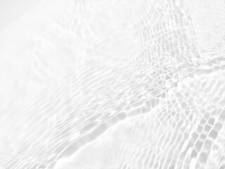 Obraz premium Defocus blurred transparent white colored clear calm water surface texture with splash, bubble. Shining purple water ripple background. Surface of water in swimming pool. White bubble water shine.