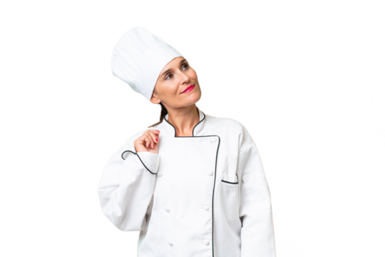 Middle-aged chef woman over isolated background thinking an idea