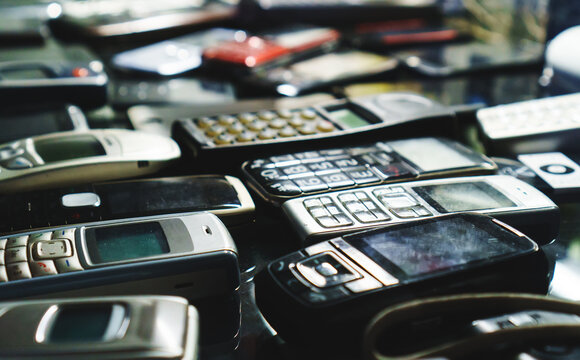 Collection of old retro mobile telephones.
