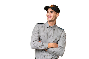 Young security man over isolated background happy and smiling