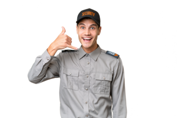 Young security man over isolated background making phone gesture. Call me back sign