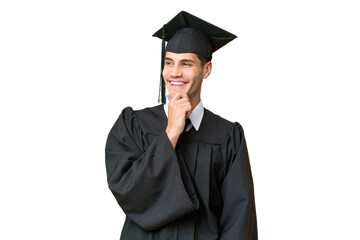 Young university graduate caucasian man over isolated background looking to the side