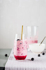 Blackcurrant smoothie with natural yogurt.