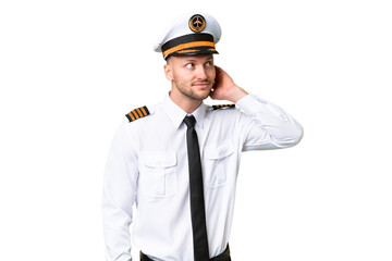 Airplane pilot man over isolated background thinking an idea