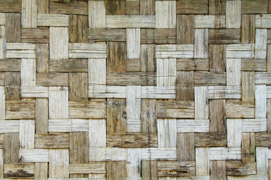 The walls are made of bamboo woven into a grid shape.