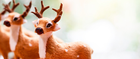 Lots of Christmas deer dolls.