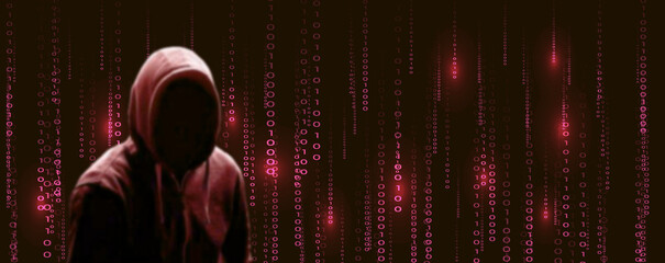 Silhouette du cybercriminel sur fond de données binaires rouge