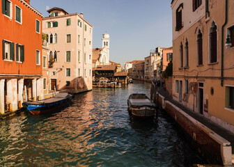 Fototapeta na wymiar Venetian Canal, boats and buildings 