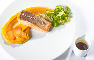 Grilled salmon steak with vegetables