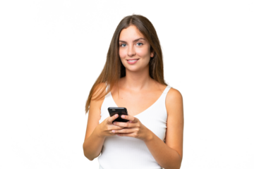 Young pretty woman over isolated background sending a message with the mobile