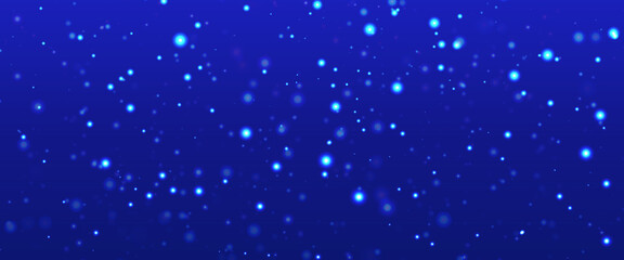 Colorful background blurry snow. Bokeh background with snowflake. Winter glittering snowflakes swirl bokeh background, backdrop with sparkling blue stars. Snowflake winter season.