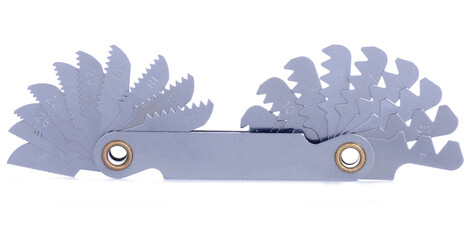 Metalic thread gauge on a white background isolation