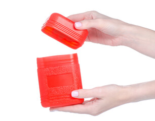 Red plastic box container in hand on white background isolation