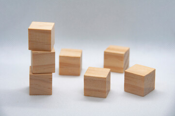 Blank wooden cubes on white background with customizable space for text or ideas.