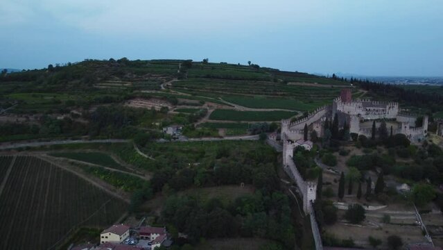 Aerial view of Veneto, Italy, with a view of breathtaking agricultural fields and the Soave Castle