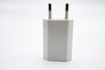 White, phone charger on isolated white background, close,up